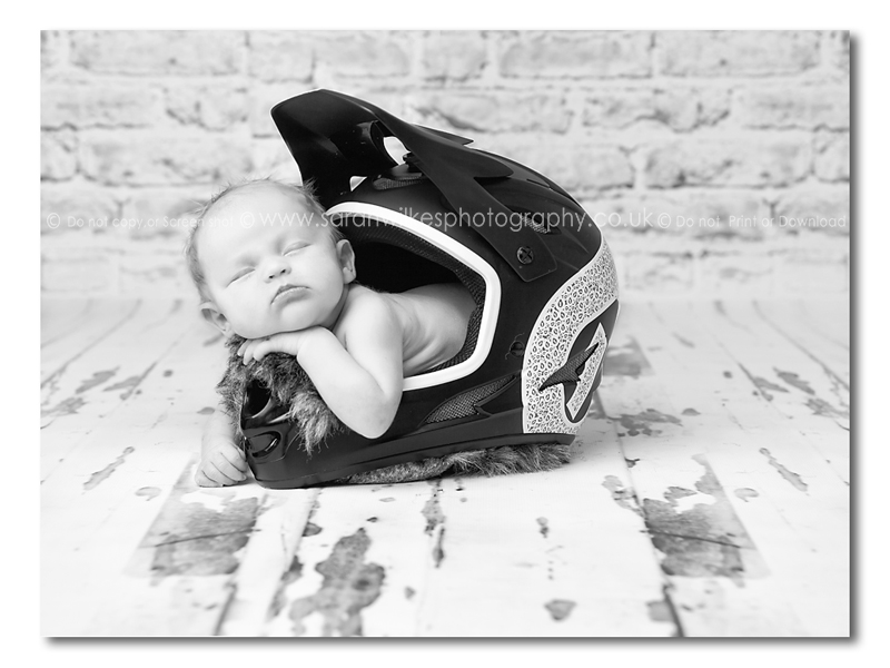 Newborn in Bike helmet
